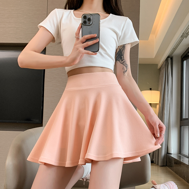 Skirt mini berlipat warna putih untuk wanita, skirt gelembung gaya A-line pinggang tinggi, gaya preppy yang manis.